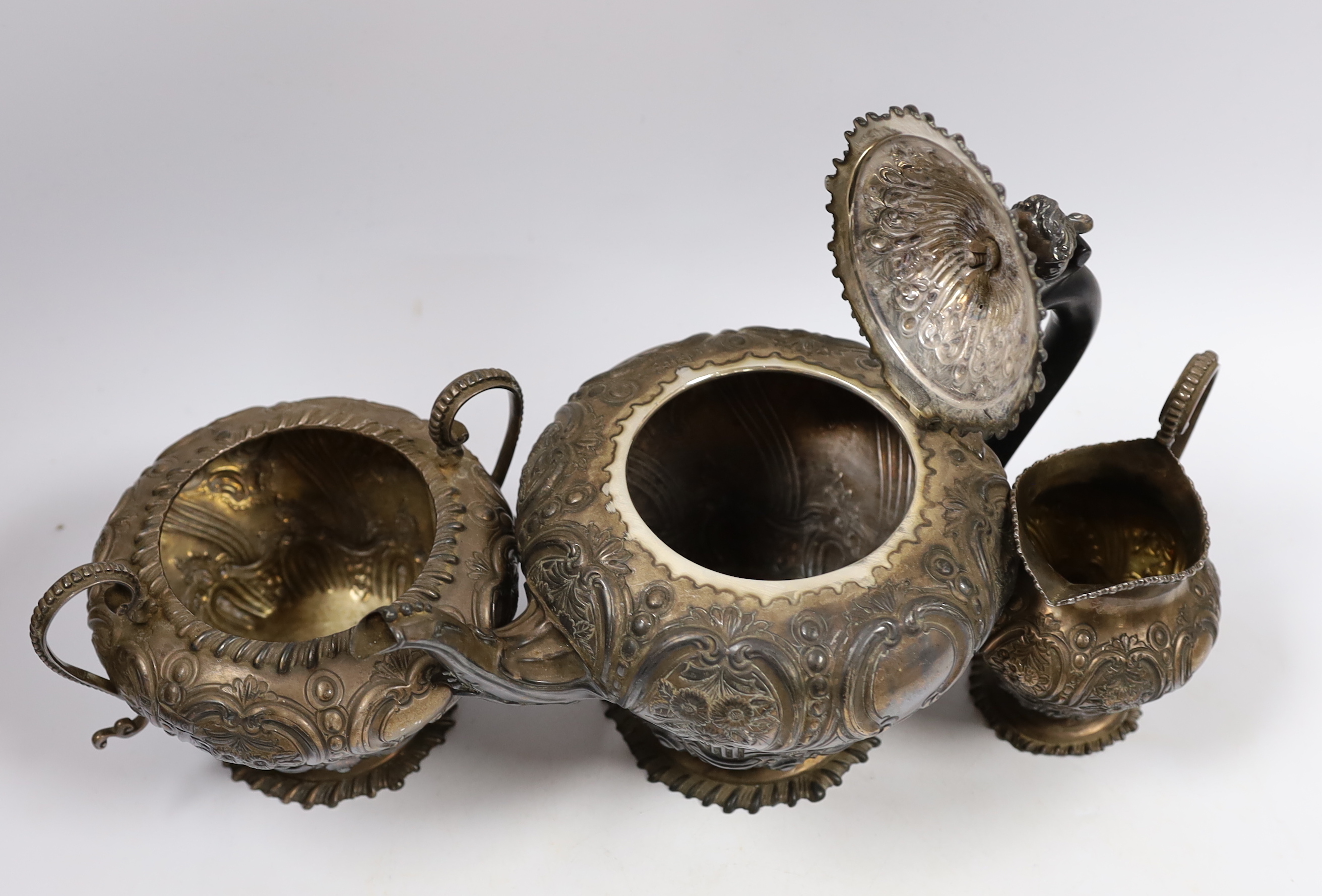 A late Victorian embossed silver inverted pear shaped three piece tea set, W & C Sissons, London, 1891, gross weight 41oz.